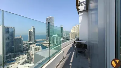 a balcony with a view of a city at Vogue Marina, Condor Marina Star near Ain Dubai and JBR Beach, One Bedroom Apartment with Balcony and City View, Access to all Amenities in Dubai