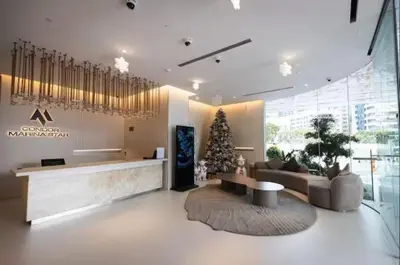 a lobby with a christmas tree in a building at Vogue Marina, Condor Marina Star near Ain Dubai and JBR Beach, One Bedroom Apartment with Balcony and City View, Access to all Amenities in Dubai