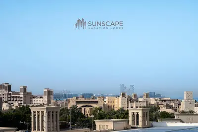 a view of the city from the roof of a building at Designer 1BR with Skyline View in MJL - Near Iconic Burj Al in Dubai