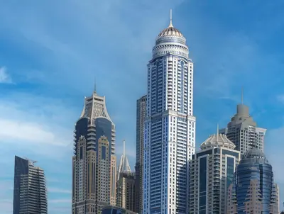 a group of tall buildings in a city at Marina Sea View Room Dubai in Dubai