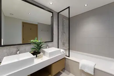 a bathroom with two sinks and a large mirror at Maison Privee - Tranquil Living with Golf Course Vws in Dubai Hills in Dubai