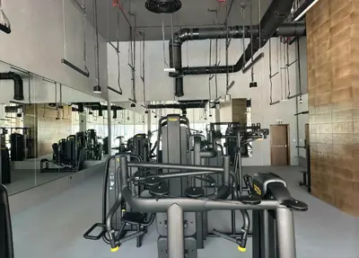 a gym with lots of exercise equipment in a room at HAVN - High Floor 2 bedroom in Downtown in Dubai