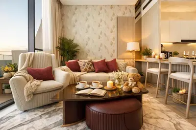 a living room with a couch and a table at High-Floor Apartment with Balcony Pool in Dubai
