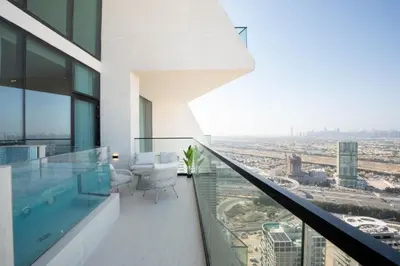 an office building balcony with a view of the city at High-Floor Apartment with Balcony Pool in Dubai