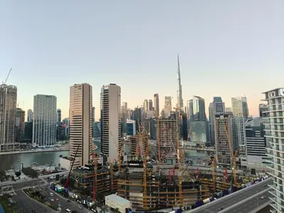 a view of a large city with buildings at High-Floor Luxe 1BR - Burj Khalifa View - Business Bay in Dubai
