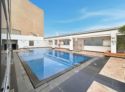 a swimming pool in the middle of a building at Luxury High-Floor Suite Museum of the Future View in Dubai