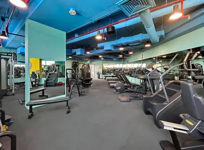a gym with treadmills and elliptical machines at Luxury High-Floor Suite Museum of the Future View in Dubai