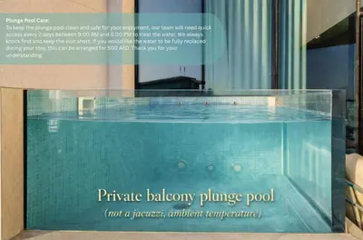 a display case with a swimming pool in a building at Elegant High-Floor Apartment with Pool in Dubai
