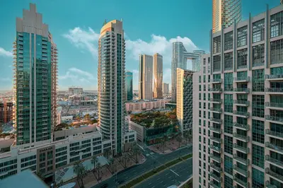a view of a city with tall buildings at Spacious 1BR & Study Burj Khalifa View, Downtown in Dubai
