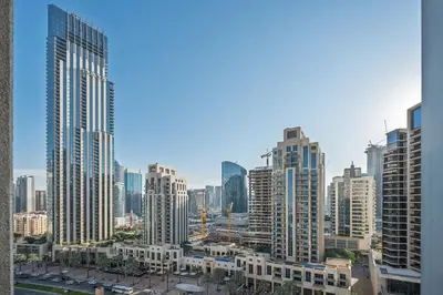 a view of a city with many tall buildings at Elegant studio balcony boulevard view in Dubai