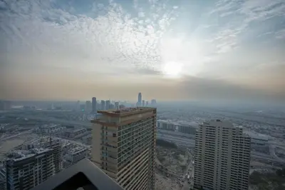 a view of a city from the top of a building at Exclusive Luxury Apartment with Private Pool in Dubai