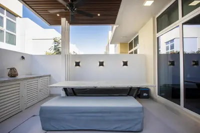 a meditation room with a bench and a large window at 3BR Townhouse Rooftop Terrace Just Cavalli in Dubai