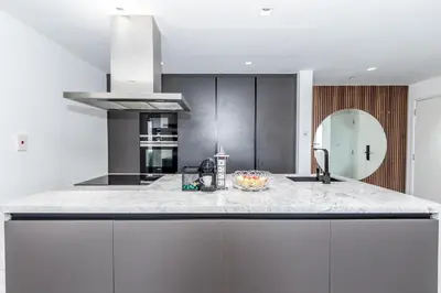 a kitchen with a counter with a bowl on it at Luxury 2BR Sea View Jumeirah Beach Residence in Dubai