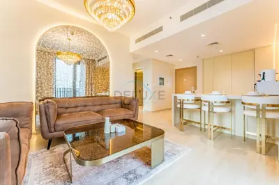 a living room with a couch and a table at Community View, Near Dubai Creek Harbour Marina Walk - Summer at Creek Beach Building 2 by Deluxe Holiday Homes in Dubai