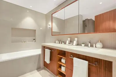 a bathroom with a sink and a mirror at Keylid Stunning3BR and Maid connected to Dubai Mall in Dubai