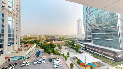 an aerial view of a city with buildings at 2 bedroom JLT with park view in Dubai