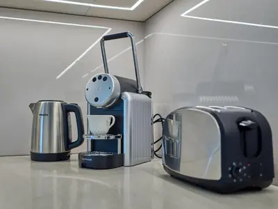 a toaster and a toaster and a toaster at Amazing 1BR Address Beach Resort With Private Beach in Dubai