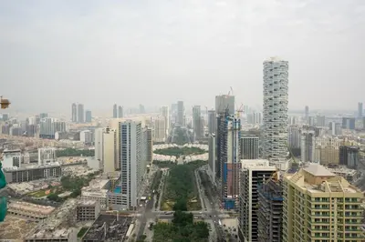 an aerial view of a city with tall buildings at Royale Family Apartment 281 with Plunge Pool in Dubai