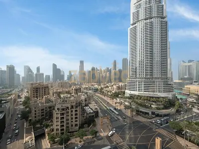 a view of a city with a tall building at Zapbed House Luxury 2BR at Boulevard Point Walk to Dubai Mall in Dubai