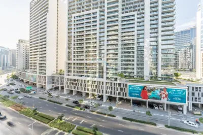 an aerial view of a city with tall buildings at Prime Waterfront Living, Just Moments from Marine Transport, Bus Stops, and Dubai Water Canal, Waters Edge, Business Bay by Deluxe Holiday Homes in Dubai