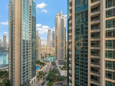 an aerial view of a city with tall buildings at Zapbed Stylish Studio Boulevard Central 2 Down Town Dubai in Dubai