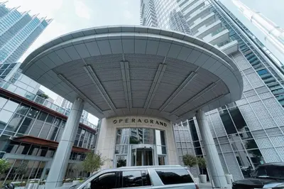 a car parked in front of a building at Luxury 1BR Apartment near Burj Khalifa & Dubai Mall in Dubai