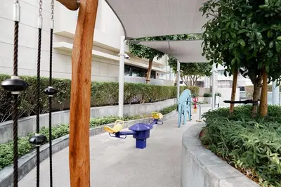a playground with a blue table and chairs in a building at Luxury 1BR Apartment near Burj Khalifa & Dubai Mall in Dubai
