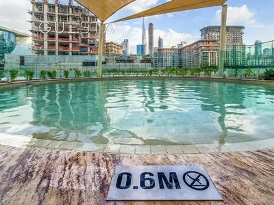 a swimming pool on the roof of a building at Myrtle Central Park, City Walk Dubai in Dubai