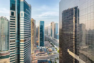 a view of a city with many tall buildings at FiveX Luxury 2BR at Lake Point JLT in Dubai