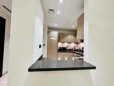 a kitchen with a counter top in a room at Greens Community View Spacious 1BR Fully Furnished in Dubai