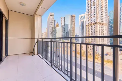 a balcony with a view of the city at Compact 1 BHK Apartment in Dubai