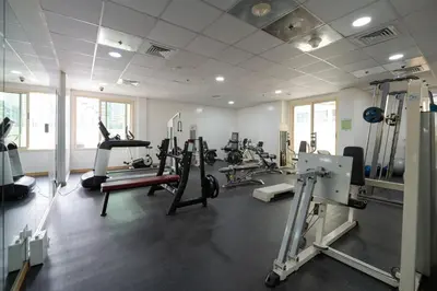 a gym with treadmills and machines in a room at Marcopolo - Relaxing 1BR in Dubai Marina with Huge Balcony in Dubai