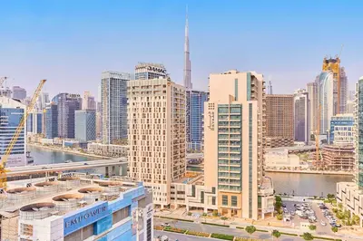 a view of a large city with tall buildings at Bright 1 BHK in Prime Location in Dubai