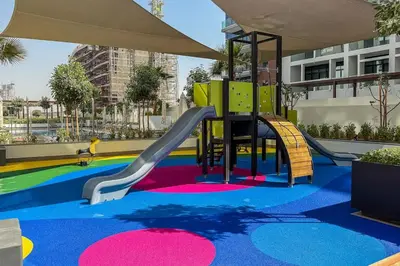 a playground with a slide in a building at Airstay - Chic Studio in Meydan Azizi 65 - Monthly Offer Available in Dubai