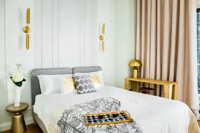a bedroom with a bed with a tray on it at Dubai Marina Penthouse Suite - Prime Location in Dubai