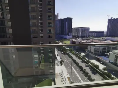 a view of a city street from a balcony at Sohba Creek Vistas Luxury 2 Bedroom with Free Parking in Downtown Dubai Near Burj Khalifa in Dubai