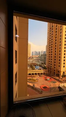 a view of a city from a window at 1 Bhk with open terrace in Dubai