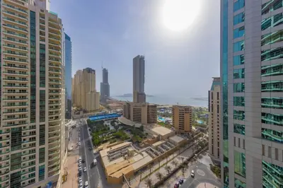 an aerial view of a city with tall buildings at VayK - Amazing 1BR in Marina with Sea View in Dubai