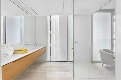 a white bathroom with a sink and a mirror at VayK - Ultra Luxury Muraba Residences in Palm in Dubai