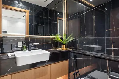 a bathroom with a sink and a mirror at VayK - Heavenly Brand New 1BR in Jvc in Dubai