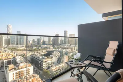 a room with a view of a city at VayK - Heavenly Brand New 1BR in Jvc in Dubai