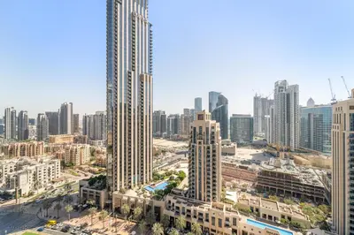 an aerial view of a city with tall buildings at VayK - Modern 1BR in Downtown Dubai in Dubai