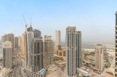 an aerial view of a city with tall buildings at VayK - Elegant 2BR with Luxury Amenities in LIV Marina in Dubai