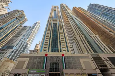 a tall building in a city with tall buildings at VayK - Contemporary 2BR in Dubai Marina in Dubai