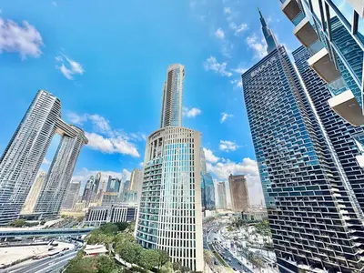 a view of a city skyline with tall buildings at EasyGo - Elegant 1BR in Downtown Dubai in Dubai