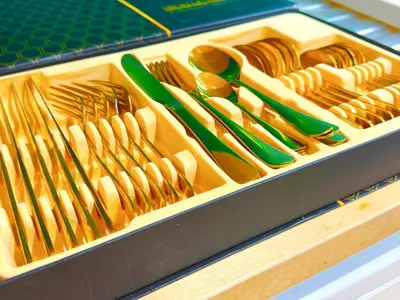 a plastic lunch box filled with utensils and utensils at JBR l Full Sea View l 4BR l 3min to Beach l 7-12PAX in Dubai