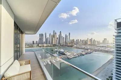 a view of the city from the balcony of a building at Luxury 3BR Marina View at Palace Beach Residence in Dubai