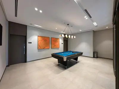 a billiard room with a pool table in it at Polo Bar DXB a High Floor 1BDR in Downtown Dubai in Dubai