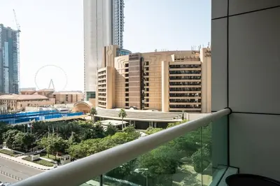 a view of a city from the balcony of a building at Royal oceanic Dubai marina in Dubai