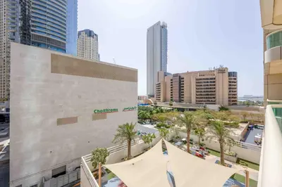 an aerial view of a city with tall buildings at Royal oceanic Dubai marina in Dubai